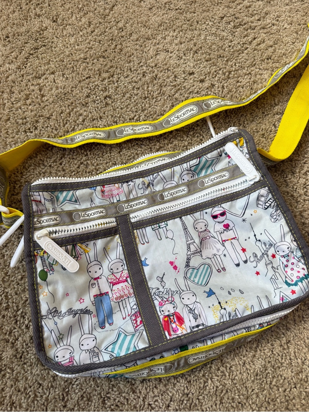 LeSportsac Fifi Lapin White Crossbody Bag with Yellow Strap and Gray Trim